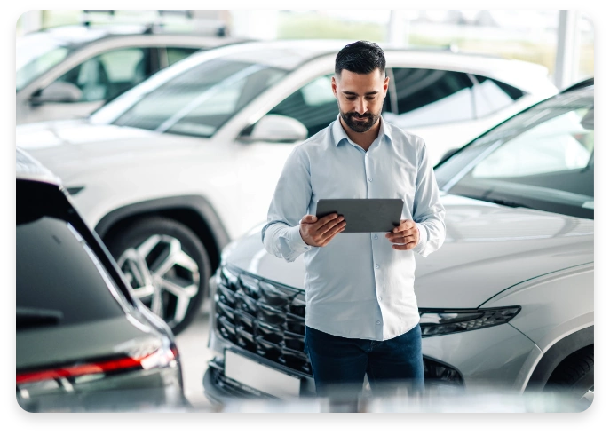 Showroom employee working with Anemone Auto